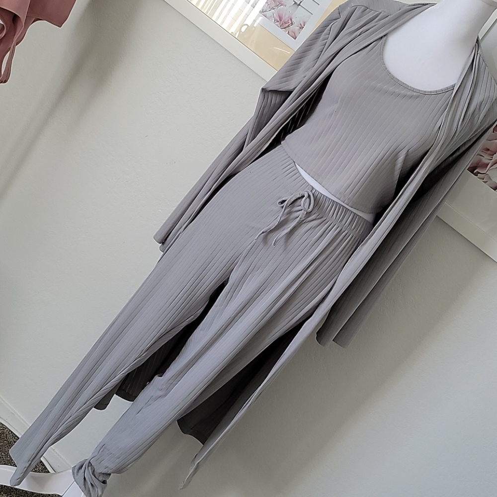 3 piece set cardigan, pants and top.